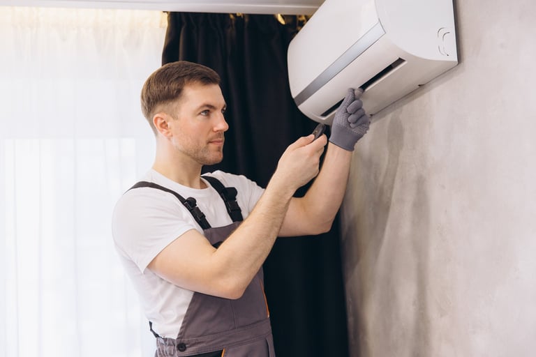 Professional HVAC technician servicing AC unit